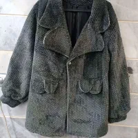 پالتو کاپشن|لباس|قدس, شهرقدس|دیوار