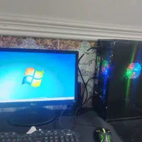 دوعدد کیس و باندل به همراه مانیتور