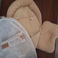 قنداق سوئیسی و بالشت