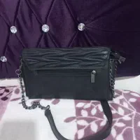 تعدادی کیف|کیف، کفش، کمربند|دورود, |دیوار