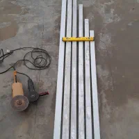 تعدادی شمشه و۲عدد سنگ فرز