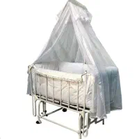 تخت و گهواره کنار تخت مادر فلزی