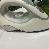 اتو لباس سرخ کن