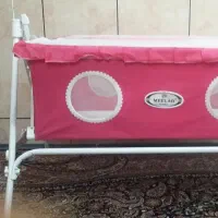گهواره نوزاد سرخابی