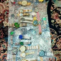 70 عدد ساعت مچی و یک عدد ایرپاد