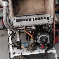 تعمیر و سرویس انواع پکیج آبگرمکن بخاری گاز|خدمات پیشه و مهارت|شیراز, زرهی|دیوار