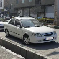 مزدا ۳۲۳ تیپ ۵ اتوماتیک سانروف دار مدل ۱۳۸۵