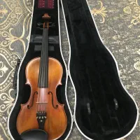 معاوضه با گیتار الحمبرا یا کویینکا