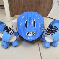 اسکیت چهار چرخ به همراه کلاه