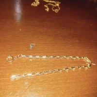 فروش مقداری طلا با فاکتور حدودا۲۵ گرم