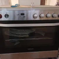 گاز اسنوا استیل.یخچال فیریزر سامسنگ.میز نهارخوری ۶