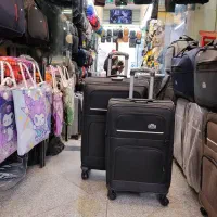 چمدان برزنتی چهار چرخ(درجه یک)ارسال فوری در مشهد