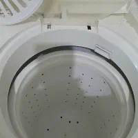 یک عددماشین لباسشویی دوقلو