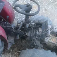 یک دستگاه تراکتور باغی