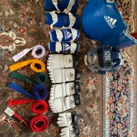 لباس مبارزه تکواندو به همراه کمربند