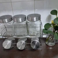 بانکه شیشه ای درب استیل