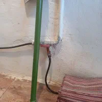 یک عدد تبر قدیمی قدیمی و یک عدد هم دیلم کار یک متر