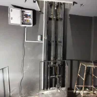 (فروش وتعمیرات بالابرهیدرولیک،پله پیما،درب برقی)