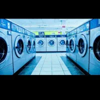 پتوشویی و خشک شویی  اتو کشی لباس پرده
