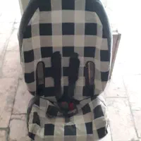 صندلی کودک خودرو ،توپ و آدم فضائی