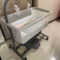 تخت گهواره کنار مادر آنیمو