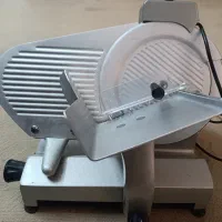 دستگاه کالباس‌بر محک