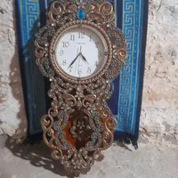 ساعت.دیوار‌هرکسی خواست‌زنگ‌بهزن‌قیمت‌یک‌میلیون