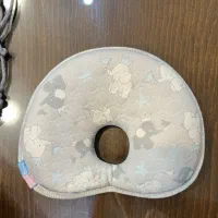 بالش و ضربه گیر سر نوزاد