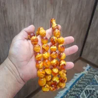 تسبیح کهربا پرچمی