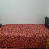 تخت ی نفره سالم چرم قهوه ای با تشک