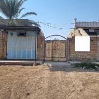 یک باب منزل مسکونی ومغازه تجاری
