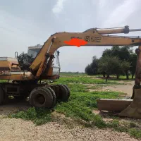 فروش بیل مکانیکی لاستیکی 912