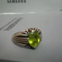 انگشتر نقره با نگین زبرجد و تعدادی انگشتر نقره