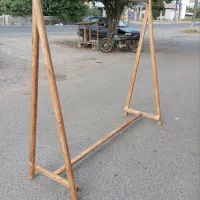 رگال لباس . چوب لباسی.