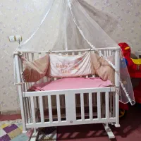 تخت کنار مادر گهواره ای