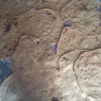 پخت نان محلی برای مصرف منزل مراسم