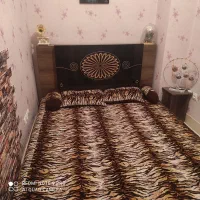 تخت خواب دونفره همراه با میز آرایش و عسلی