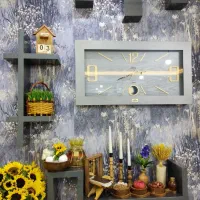 ساعت دیواری همراه شلف