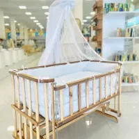 تخت گهواره ای نوزاد