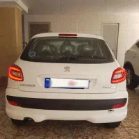 ماشینAT TU5 207i مدل 1404سفید سقف فلزی