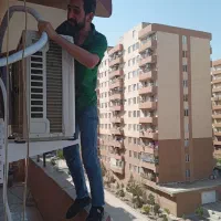 تعمیرونصب انواع کولرگازی،پکیج،پرندورباط کریم