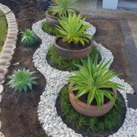 اجرای محوطه سازی باغ ویلا وکاهگل کشی