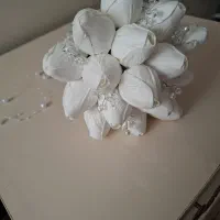 دسته گل لاله و یکسری دفتربله برون
