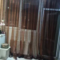 پرده توری قهوه ای