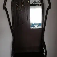 جاکفشی و آینه تمام چوب