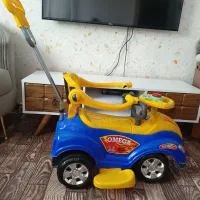 ماشین کودک دسته دار موزیکال نو تمیز استفاده نشده