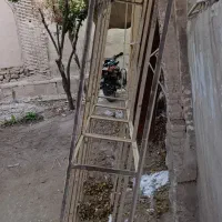 یک قفسه آهنی و یک میز|فروشگاه و مغازه|جهرم, |دیوار