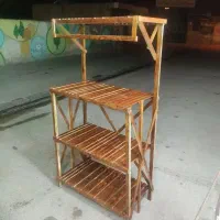 تولید انواع میز بار و رگال لباس و قفسه چوبی