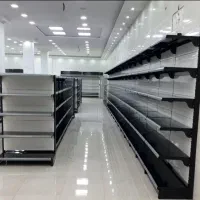 قفسه فلزی دیواری وسط فروشگاهی خود ایستا