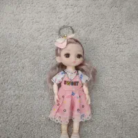 عروسک دختر مفصلی چشم تیله ای